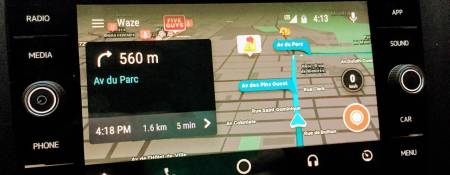 Have you tried Waze on Android Auto?